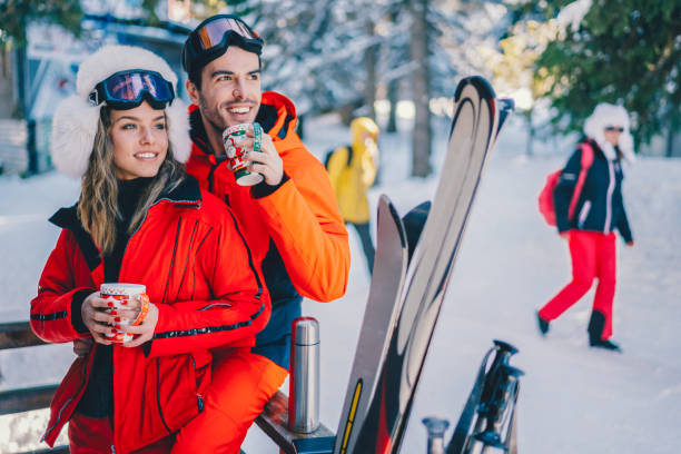 istock Couple on ski holiday 1357273566