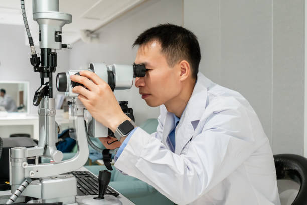 istock Ophthalmologist is adjusting ophthalmic instruments 1357274551