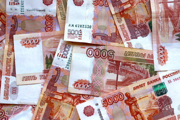 istock Mosaic of money on the table 1357278470