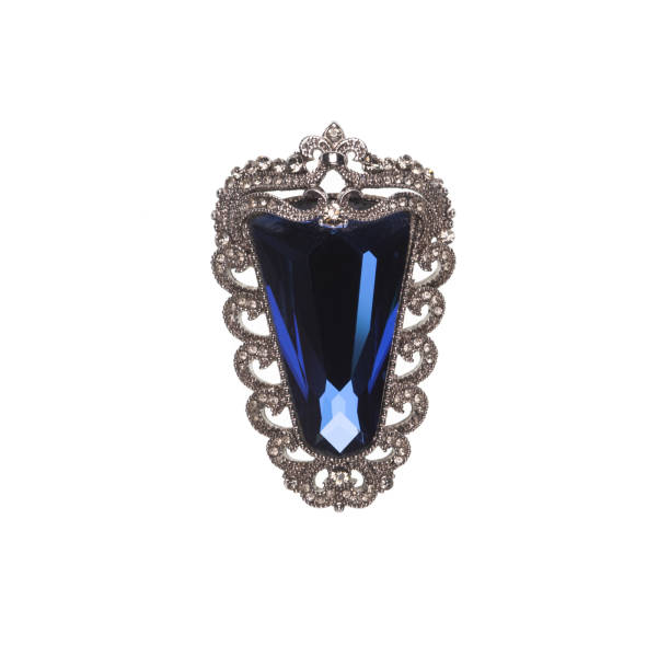 istock brooch with sapphire isolated on white background 1357279068