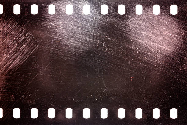 istock Dusty and grungy 35mm film texture or surface 1357281932