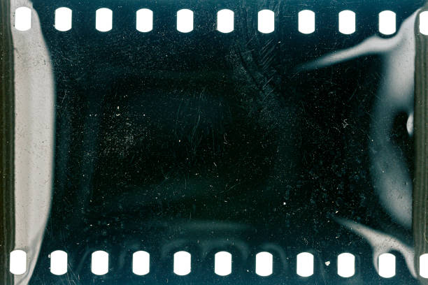istock Dusty and grungy 35mm film texture or surface 1357282018