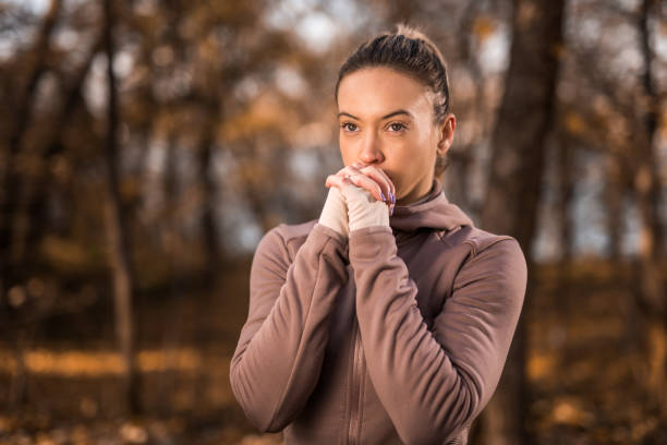 istock Young sportswoman feeling cold and warming up. 1357282519