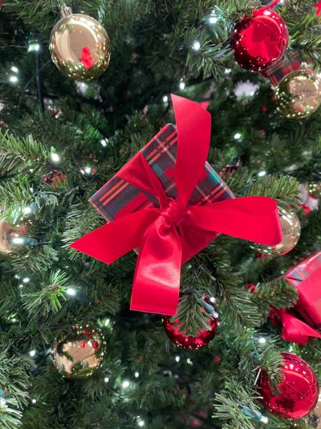 istock Christmas wallpaper background with gifts 1357283979