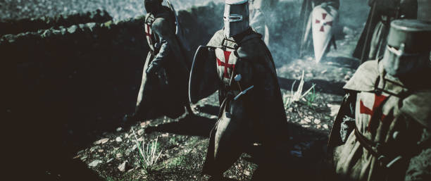 istock medieval knights passing through the village. cinematic concept. 1357287600