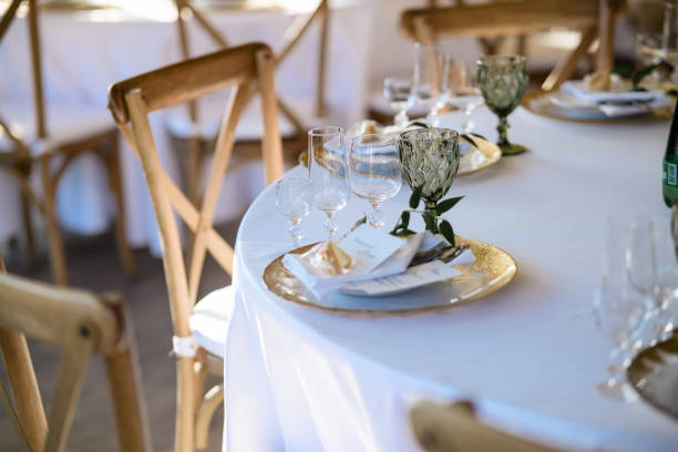 istock Glass, transparent glasses and a new, white table 1357288027