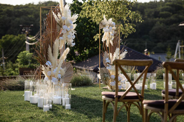 istock Decorative arch with flowers and candles 1357288050