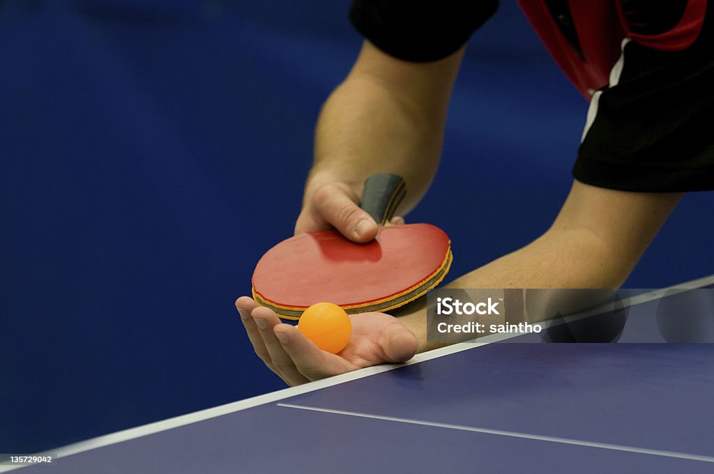 Mans hands about to serve a game of table tennis close up service on table tennis Table Tennis Stock Photo