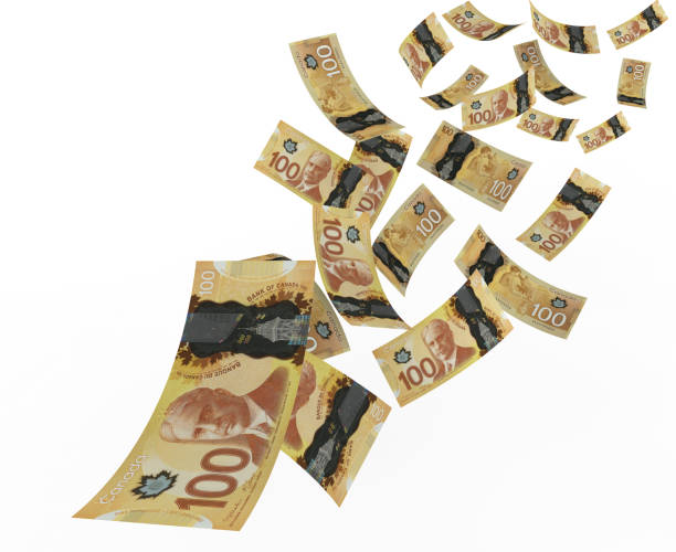un montón de billetes de dólar canadiense cayendo del cielo - canadian currency fotografías e imágenes de stock