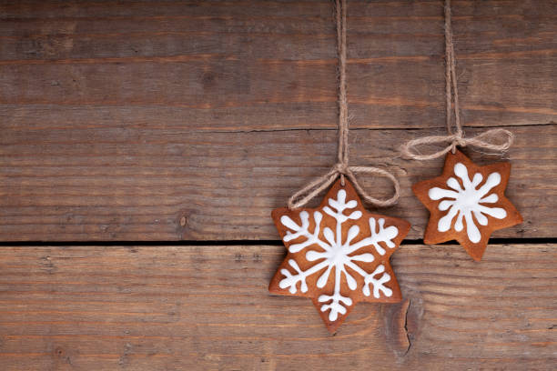 istock Christmas gingerbread cookies on wood rustic background stock 1357290553