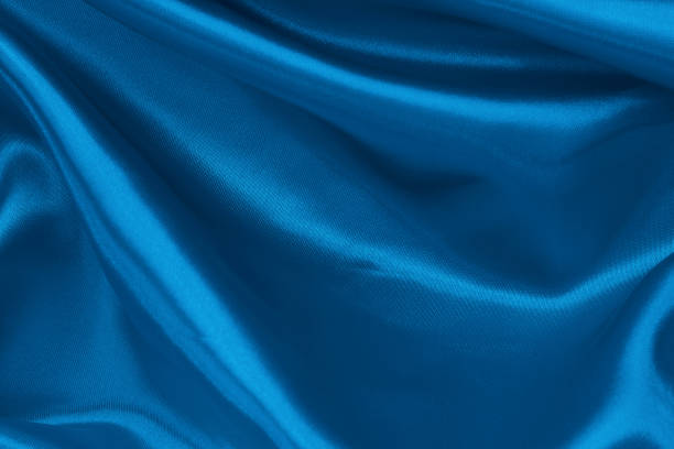 istock Dark blue fabric texture background, detail of silk or linen pattern. 1357295353