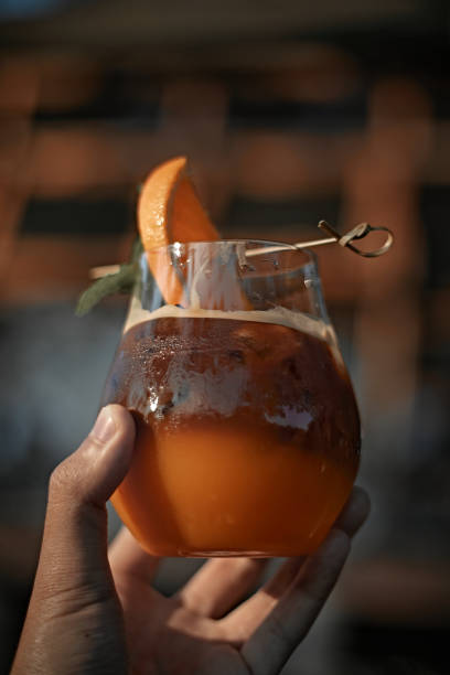 istock iced americano black coffee and layer of orange 1357295381
