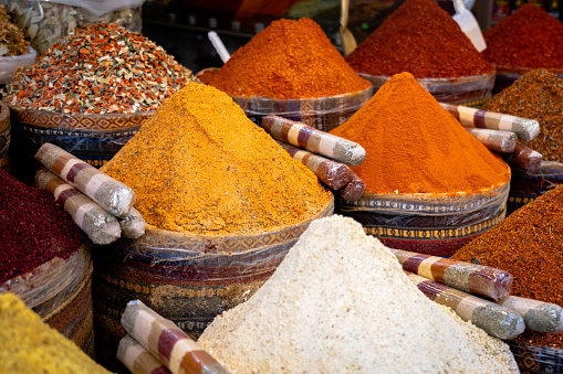 Marrakech Spice Souk Bags with spices and variety of spices and ingredients in Moroccan Medina Bazaar