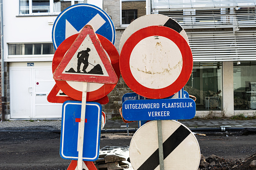 Closed road signs prepared for installation. Works on the road concept.