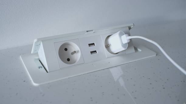 istock Retractable Pop Up Power Outlet Installed on Kitchen Counter 1357302857