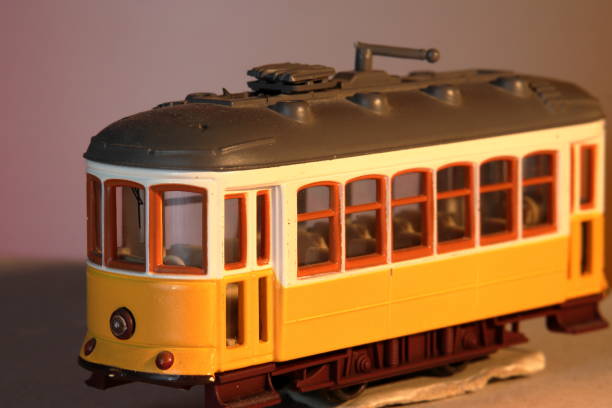 istock Old yellow Lisbon toy tram, isolated 1357303516
