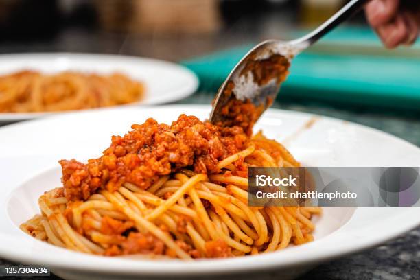 Chef Plating Pasta Spaghetti Dish Stock Photo - Download Image Now - Pasta, Bolognese Sauce, Restaurant