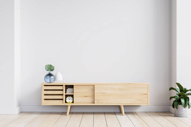 istock Simple minimal cabinet for tv interior white wall mockup. 1357306697