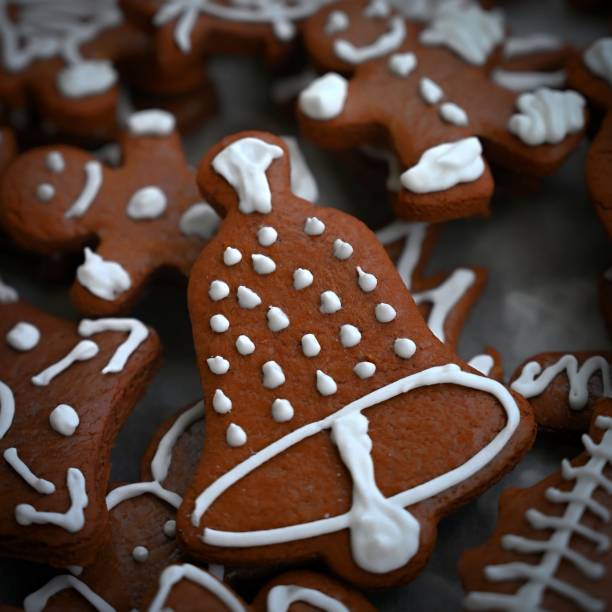 Christmas sweets. Beautiful hand decorated traditional Czech Christmas gingerbread cookies with icing.