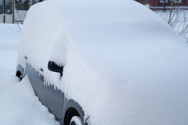 istock The car is covered with snow. 1357310076