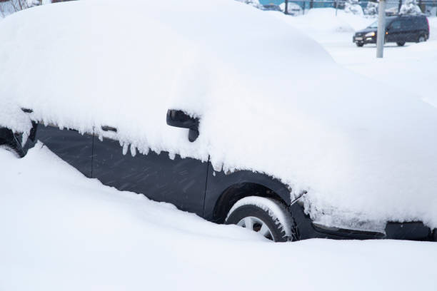 istock The car is covered with snow. 1357310082