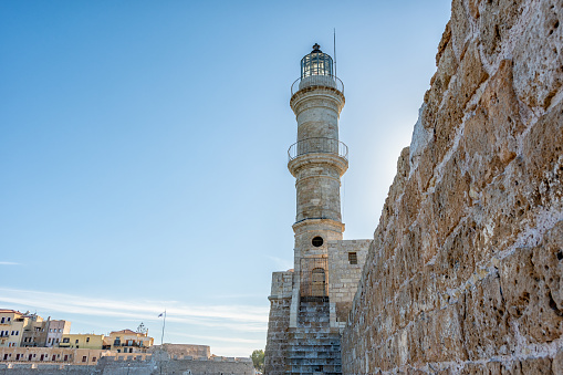 View of lighthouse in venetian harbor in Chania city on Crete island, Greece.