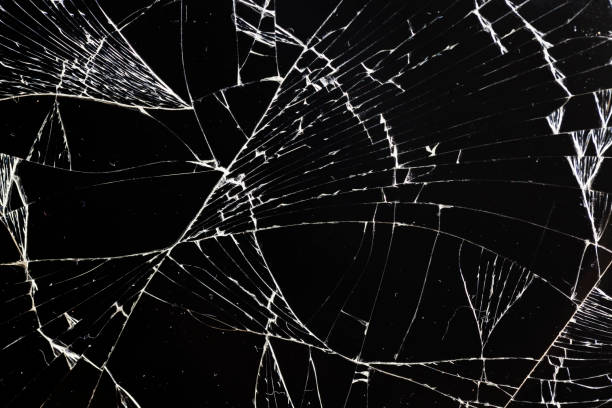 istock broken thin glass with lots of cracks 1357317153