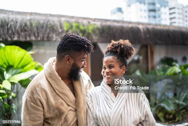 Couple Looking At Each Other At A Spa Stock Photo - Download Image Now - Couple - Relationship, Spa, Tourist Resort