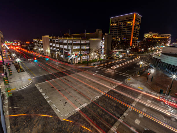 istock Busy intersection in downtown Boise with streaking car lights 1357318256