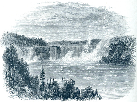 The Niagara Falls Suspension Bridge stood from 1855 to 1897 across the Niagara River and was world's first working railway suspension bridge. It connected Niagara Falls, Ontario to Niagara Falls, New York. Trains used the upper two decks, pedestrians and carriages used the lower.