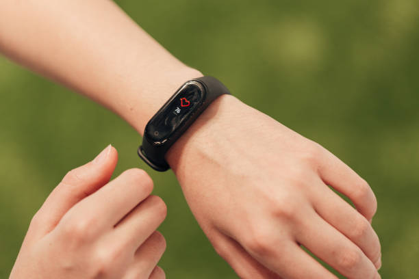 istock Smart Watch on a Human Hand. Heartbeat check 1357320734