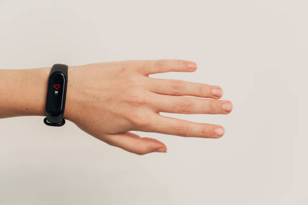 istock Smart Watch on a Human Left Hand. White background 1357320755