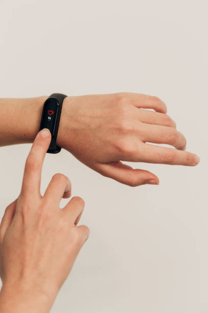 istock Smart Watch on a Human Hand. White background 1357320760