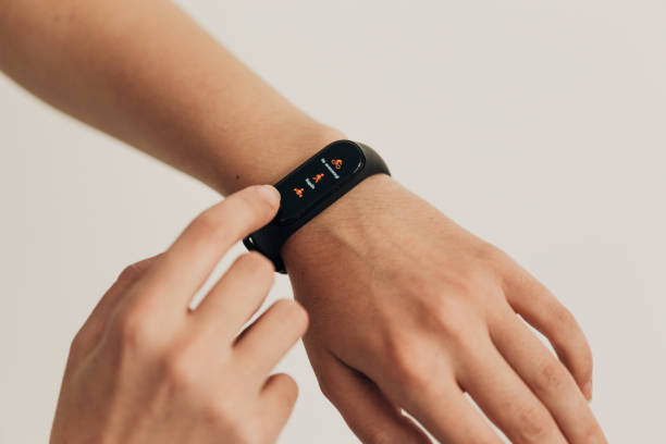 istock Smart Watch on a Human Hand. Heartbeat check 1357320777