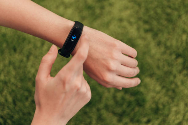 istock Smart Watch on a Human Hand. Heartbeat check 1357320793