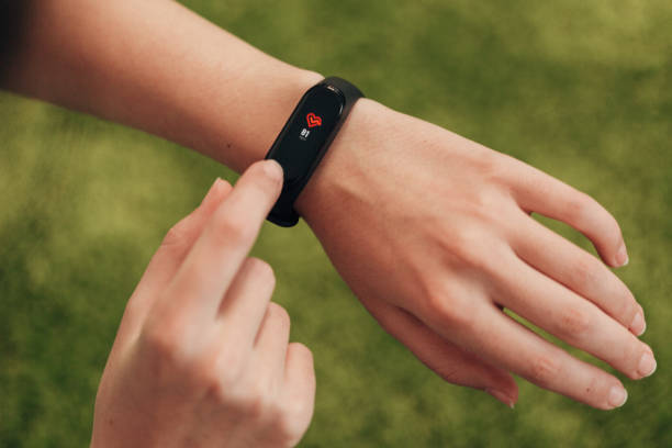 istock Smart Watch on a Human Hand. Heartbeat check 1357320812