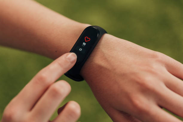 istock Smart Watch on a Human Left Hand. Heartbeat check 1357320869