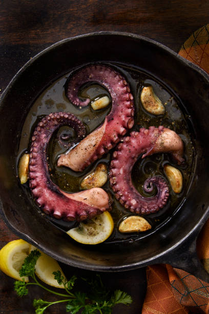 istock Braised Octopus in Garlic. Lemon and Olive Oil 1357324032