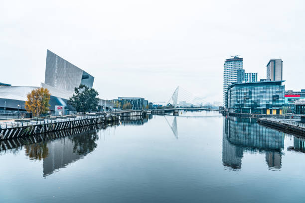 istock Foggy day at the river, England winter scene 1357325314