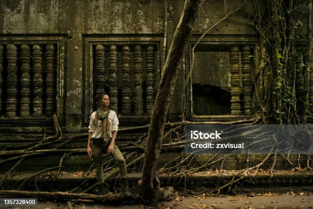 Beautiful Woman Adventurer Stock Photo - Download Image Now - Temple - Building, Angkor Thom, Long Hair