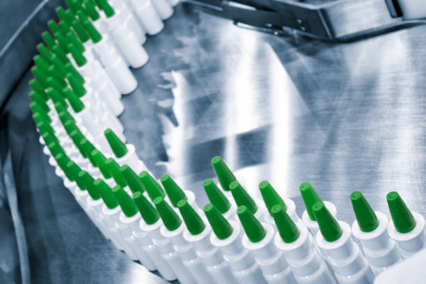 istock Close-up Many white plastic spray bottles for packaging liquid medicines or cosmetics in a row on a conveyor belt in a pharmaceutical manufacturing factory 1357330276