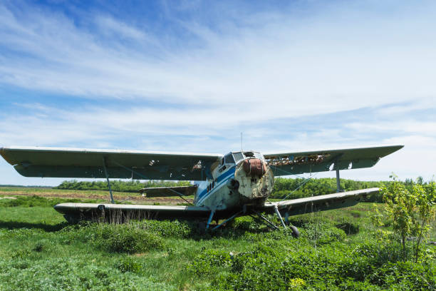 istock An old Soviet plane stands on the ground in a field 1357330418