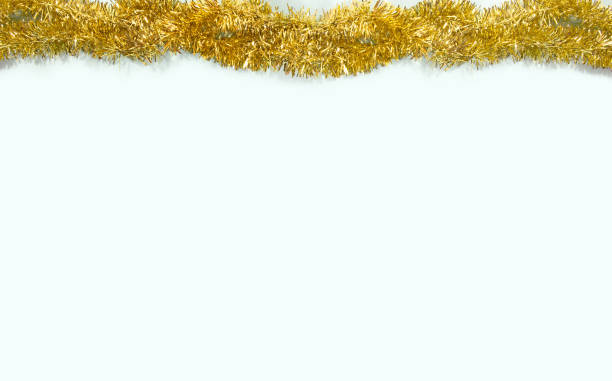 istock Christmas theme. Gold Garland  on a light blue background, view from top. 1357332335