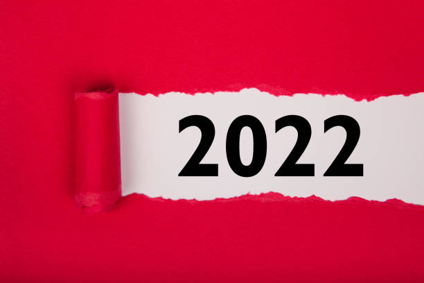 istock Torn Paper With Happy New Year 2022 On White Background 1357334035