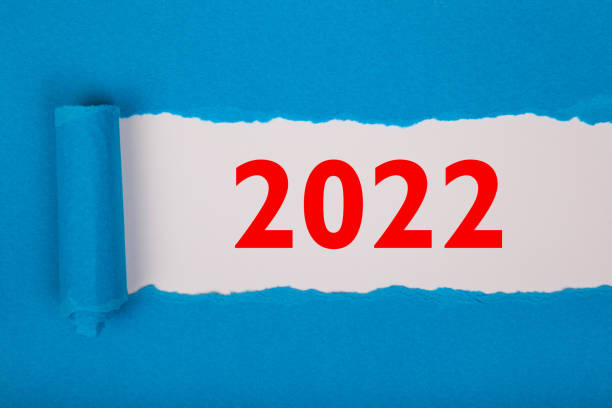 istock Torn Paper With Happy New Year 2022 On White Background 1357334102