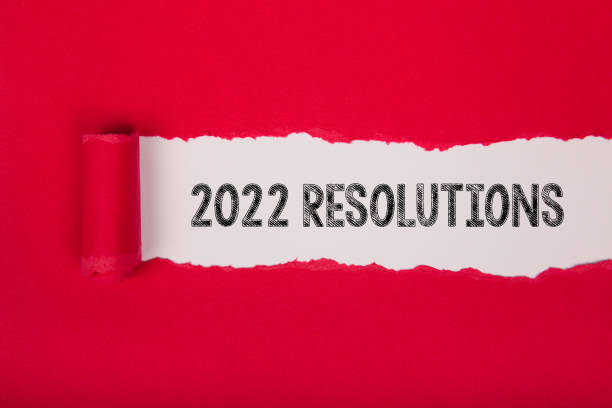 istock Torn Paper With New Year 2022 Resolutions On White Background 1357334327