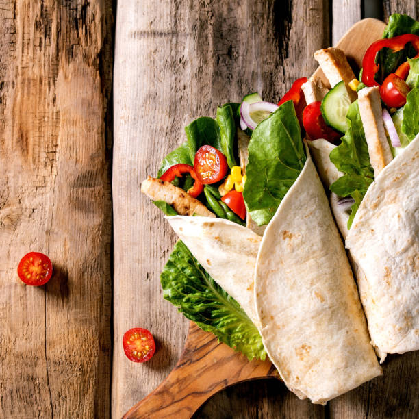 istock Traditional mexican tortila wrap with pork meat 1357335799