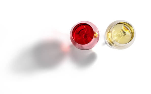 istock Assortment of glasses with wine in white background with shadows 1357336063