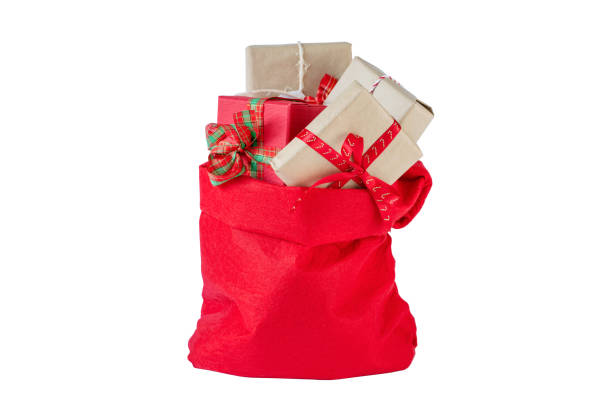 istock Santa bag with presents isolated on white 1357345056