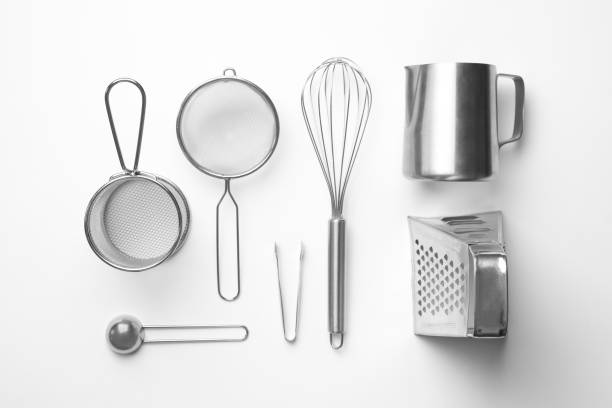istock Set of modern cooking utensils on white background, top view 1357345866